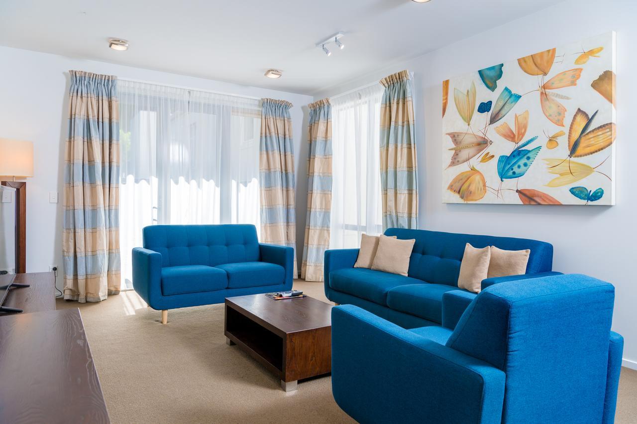 Boulcott Suites Wellington Luaran gambar A living room with blue furniture